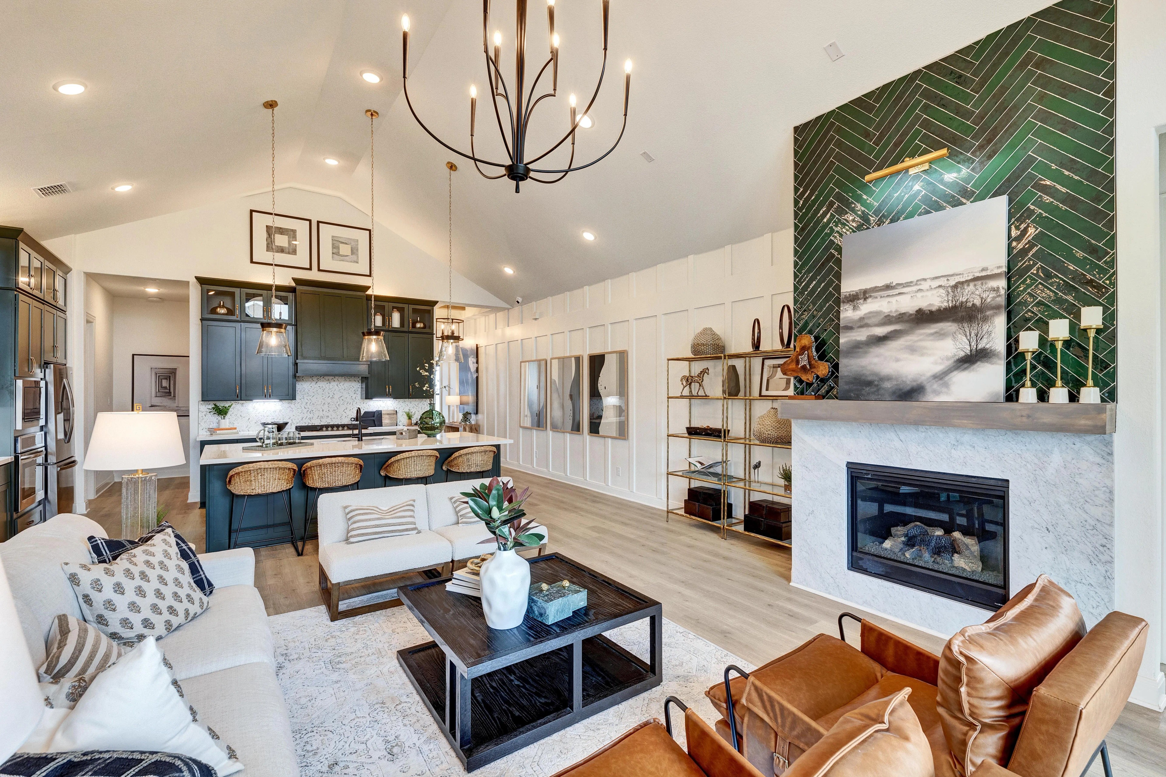 Hawkes Landing Luxury Living Room and Kitchen Interior Design Elegant living room, kitchen with dark cabinets, modern chandelier, Hawkes Landing, luxury design, wood floors.