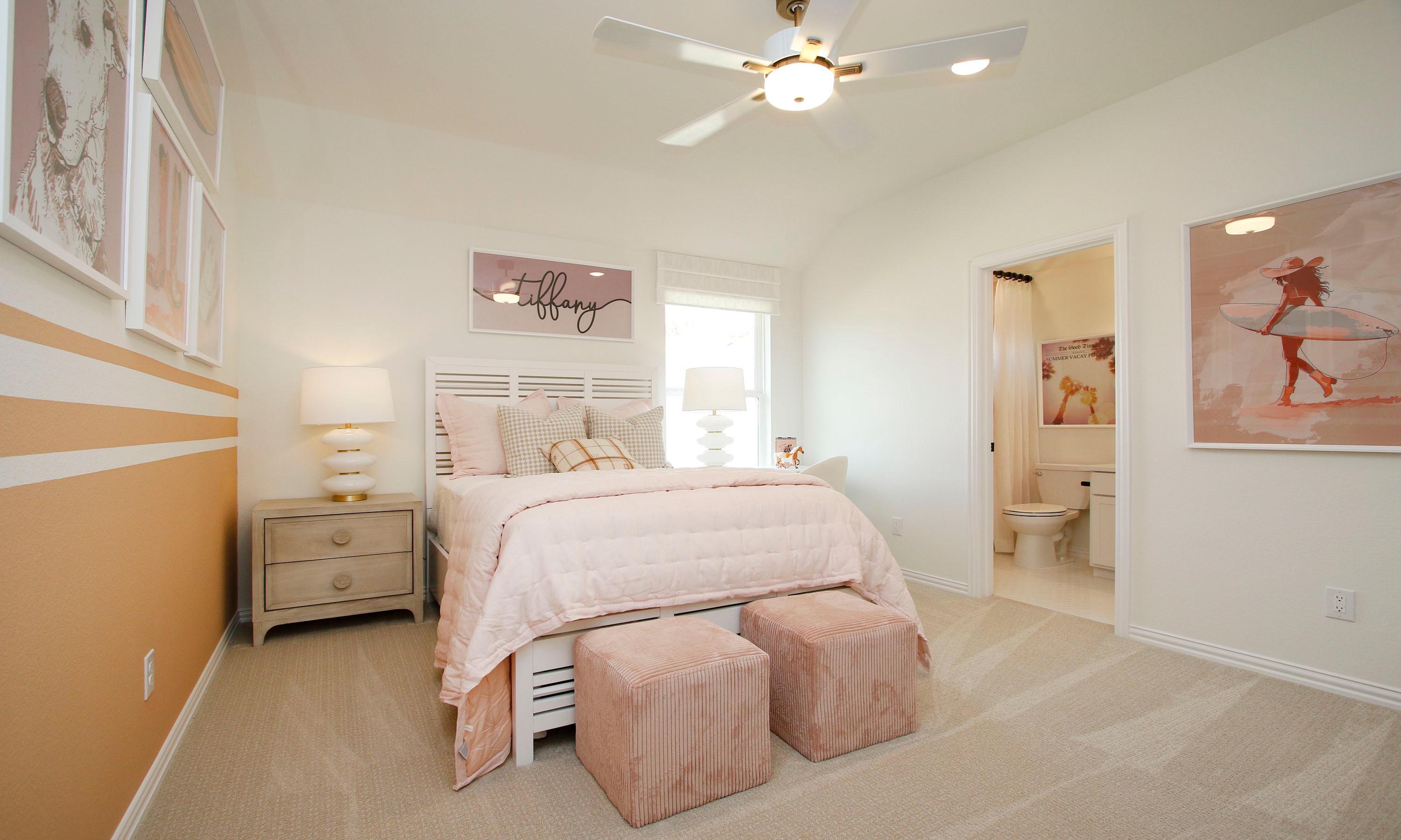 Stylish Bedroom with Modern Decor in The Woodlands Hills Chic bedroom with pastel decor, modern artwork, plush carpet, and ensuite bathroom in The Woodlands Hills.