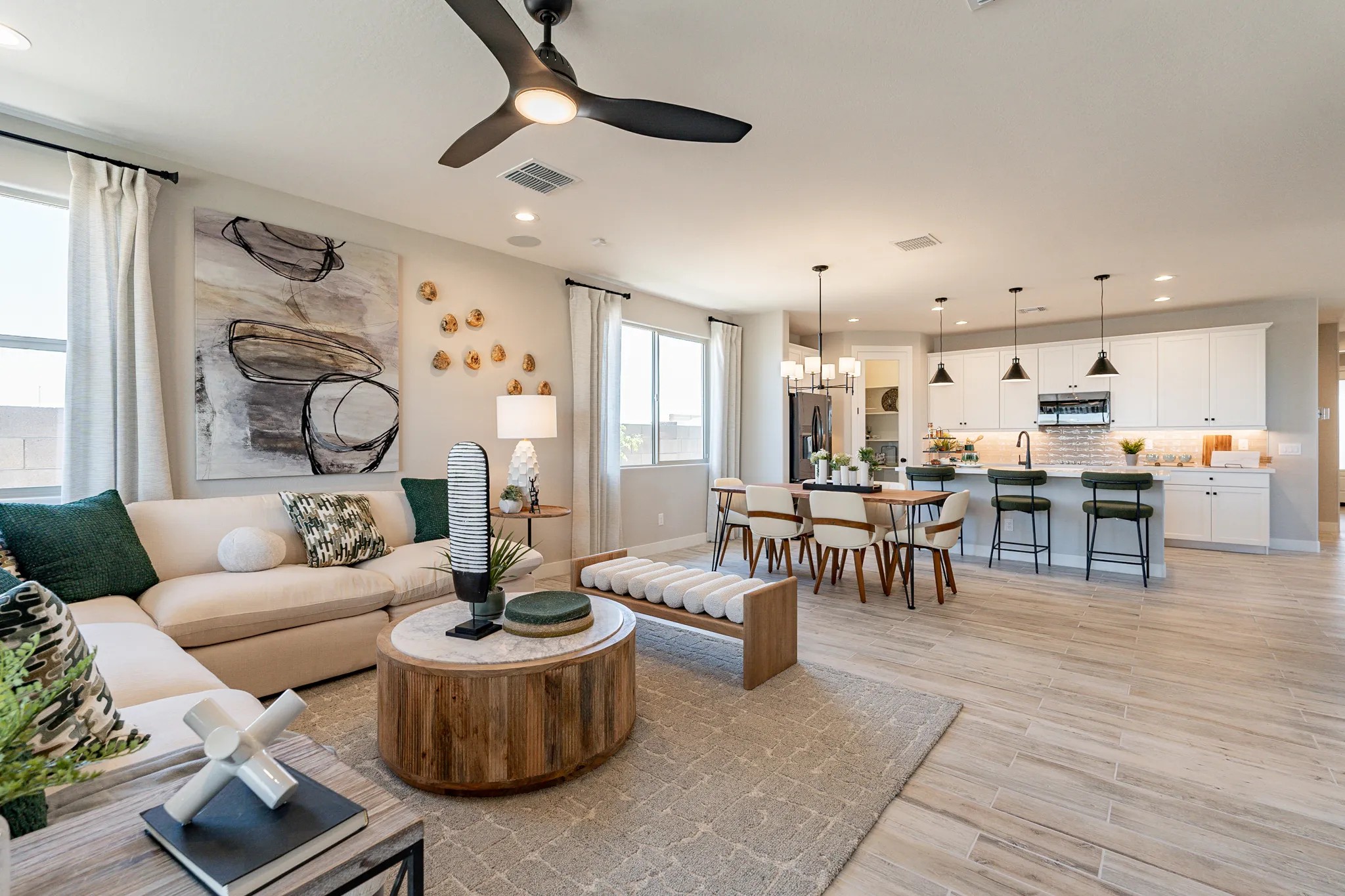 Modern Open-Concept Living Area in Sienna Park Community Modern open-concept living area, sleek furnishings, stylish kitchen, Sienna Park community.