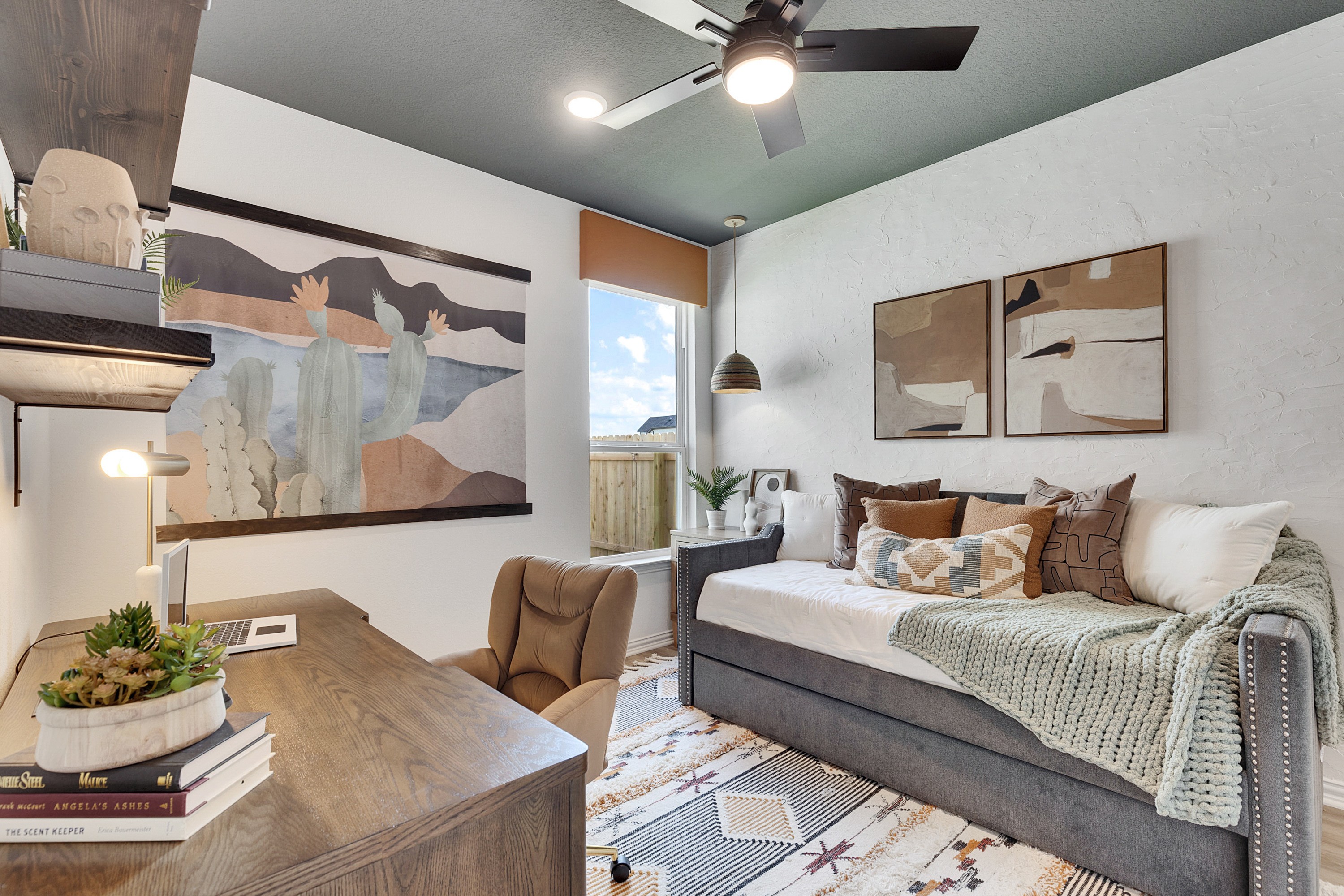 Cozy Study Room with Rustic Decor in Spring Creek Community Cozy study room with rustic decor, textured walls, wooden desk, abstract art, in Spring Creek community.
