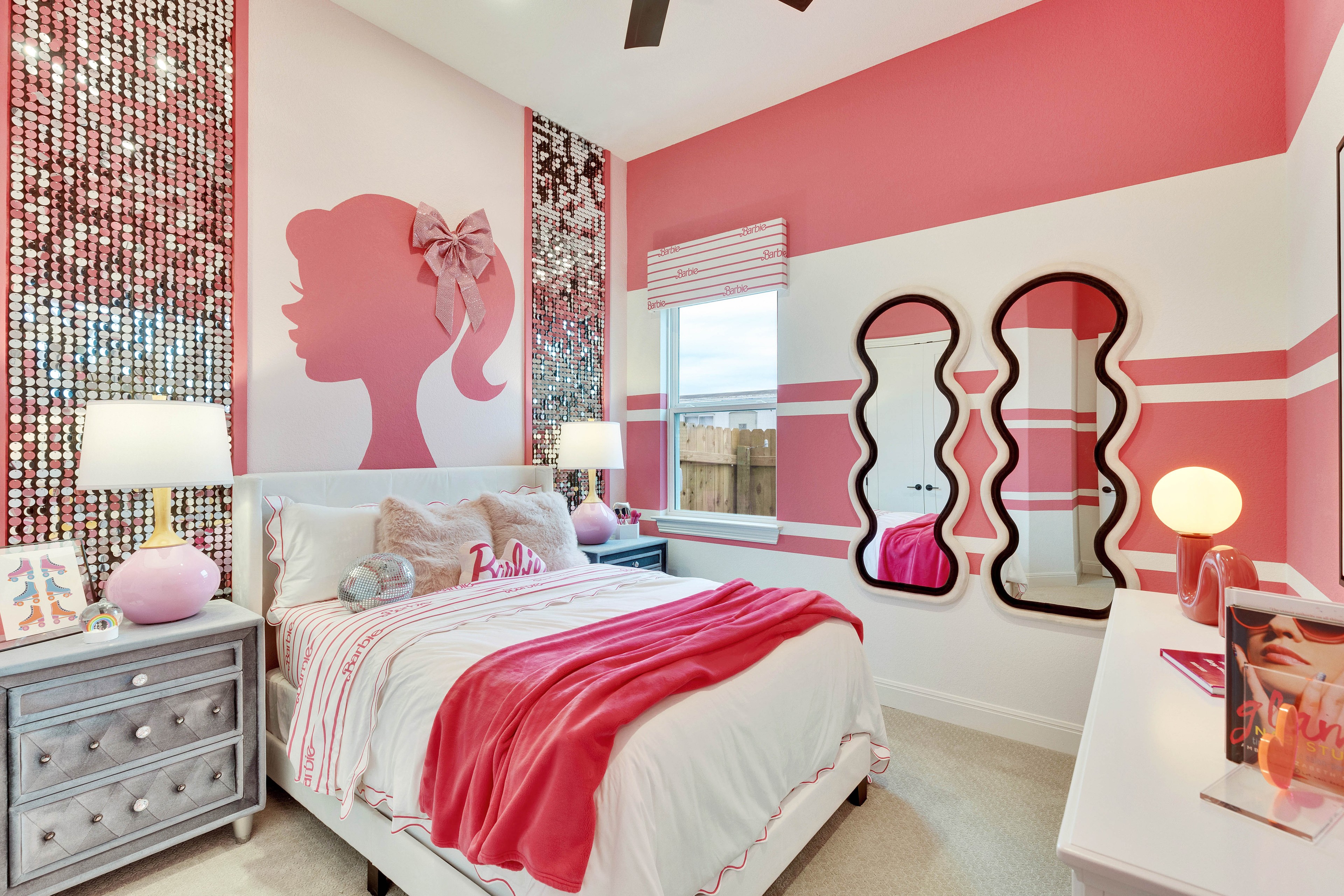 Elegant Pink-Themed Bedroom with Mural in Spring Creek Vibrant pink-themed bedroom with silhouette mural, sequin walls, stylish mirrors in Spring Creek.