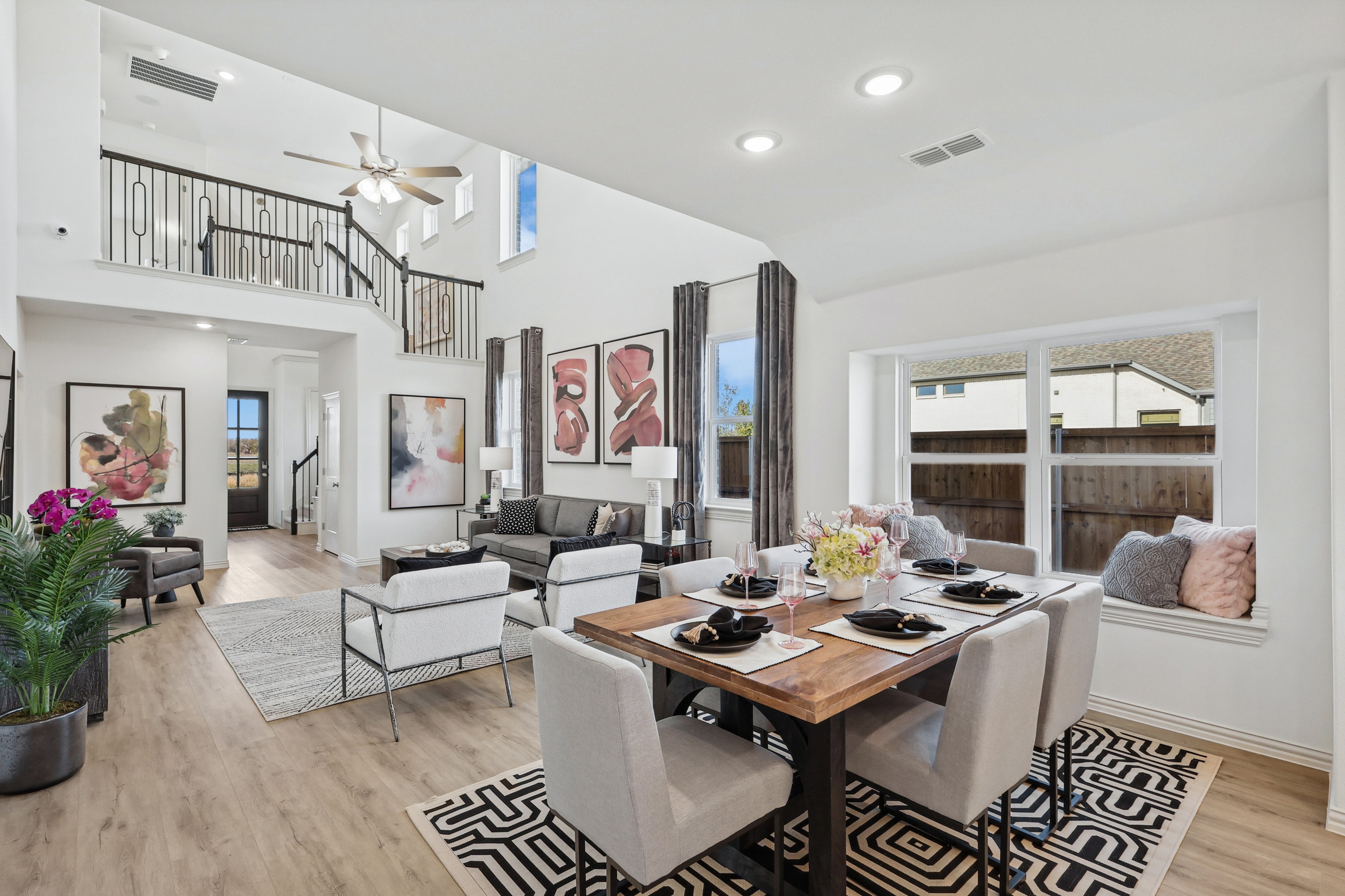 Elegant Living-Dining Interior in Bel Air Village Luxurious living-dining area with modern decor, high ceilings, and large windows in Bel Air Village.