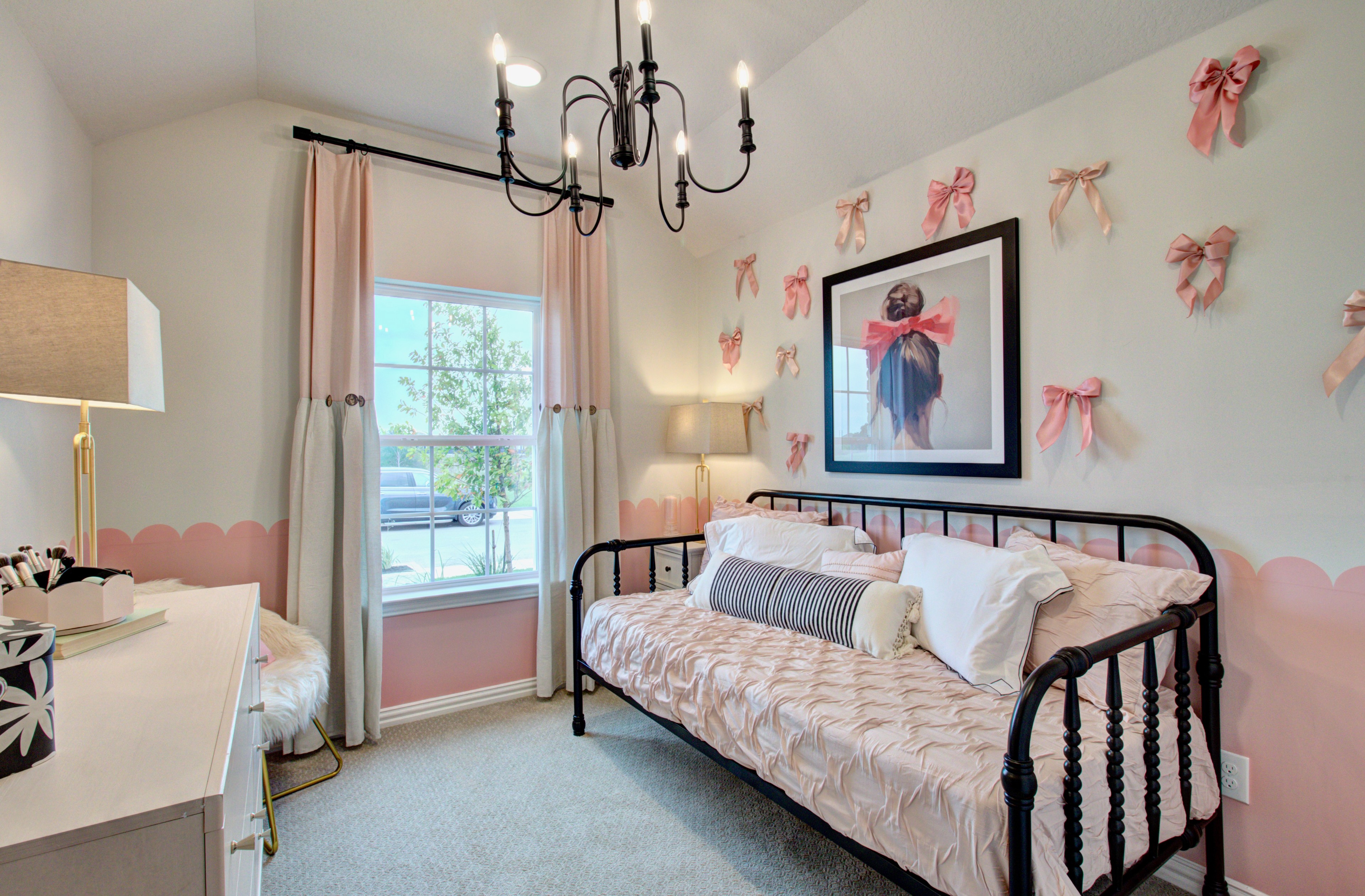 Sunflower Ridge Elegant Bedroom with Daybed and Chandelier Elegant bedroom in Sunflower Ridge with daybed, pink decor, bows, chandelier, large window.
