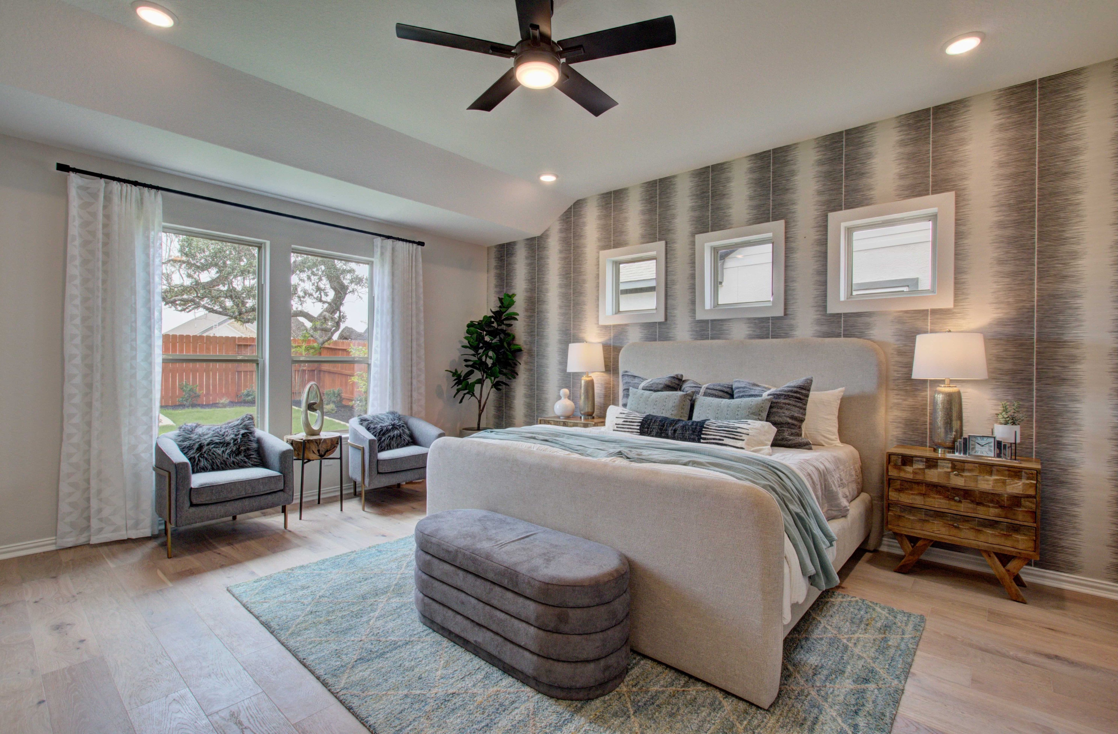 Meyer Ranch Luxury Bedroom with Modern Decor and Elegant Features Luxurious bedroom at Meyer Ranch with modern decor, large windows, stylish wallpaper, and elegant furniture in serene setting.