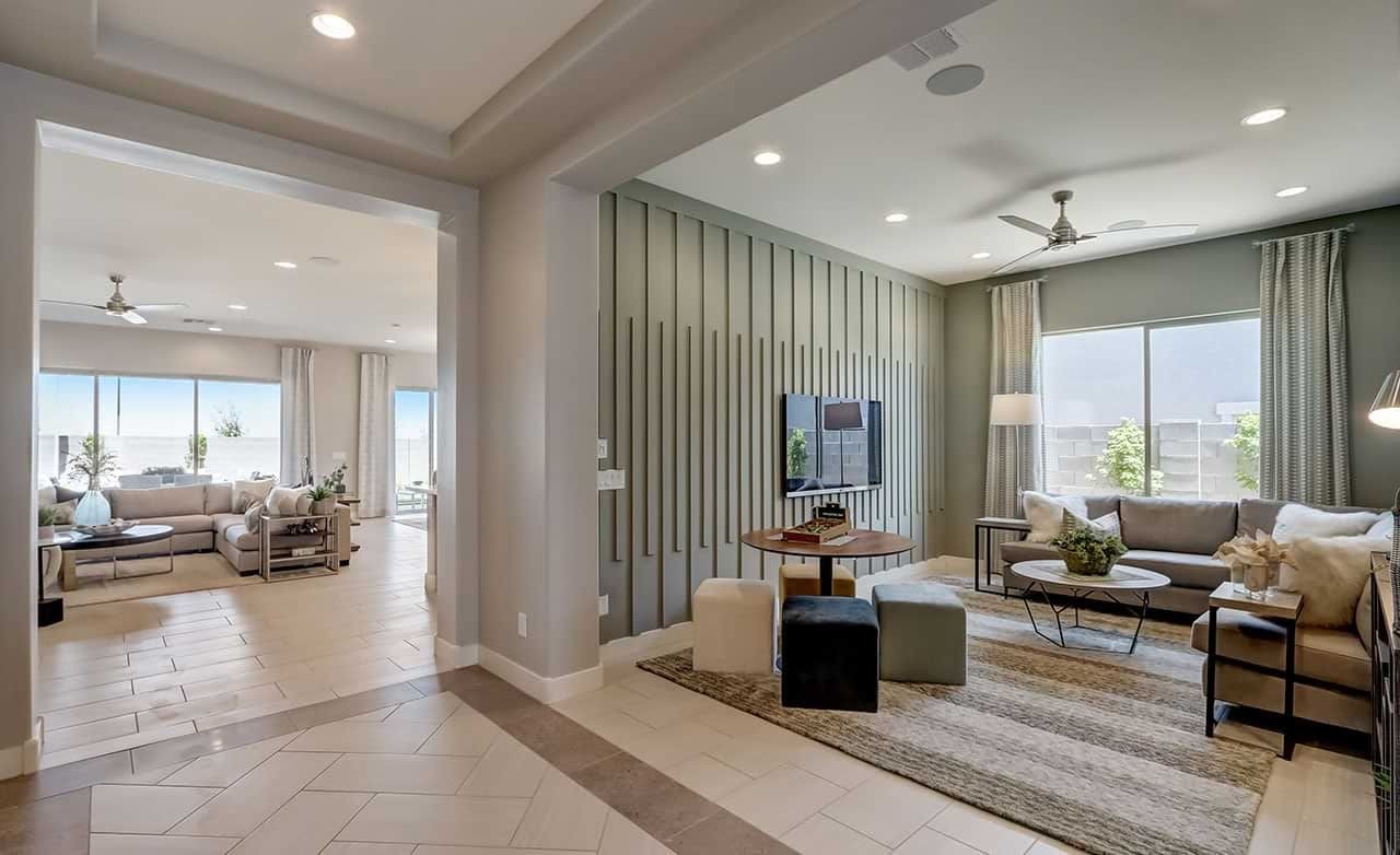 Modern Living and Lounge in Canyon Views-Hacienda Community Modern living room and lounge with large windows, light neutral tones, and sleek ceiling in Canyon Views-Hacienda community.