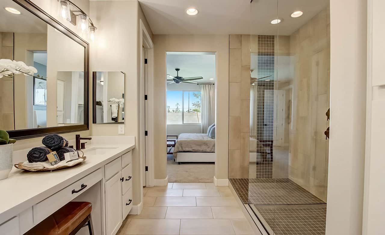 Modern Luxury Bathroom in Anderson Parc Home Modern bathroom with elegant vanity, large mirror, and spacious shower in Anderson Parc home.