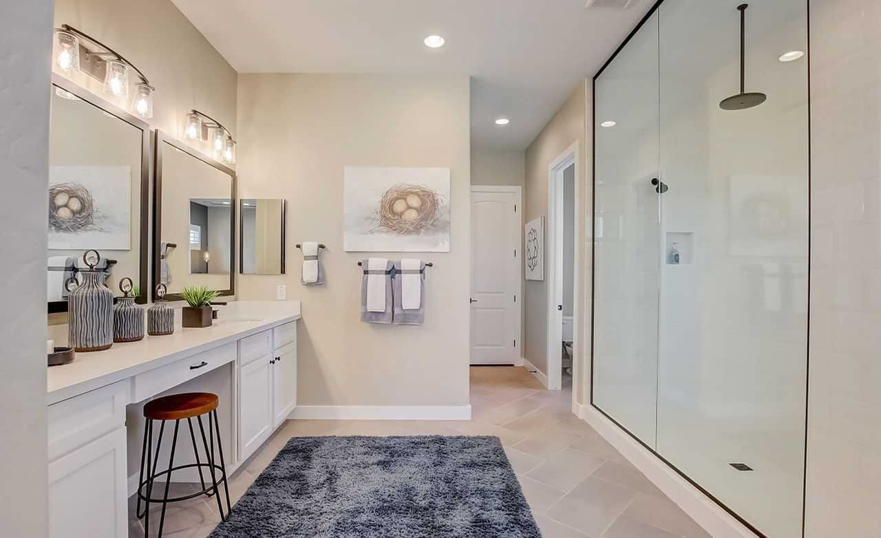 Mirada Crossing Bathroom with Glass Shower and Double Vanity, Arizona Luxurious Mirada Crossing bathroom features double vanity, glass shower, elegant lighting, modern decor, Arizona.
