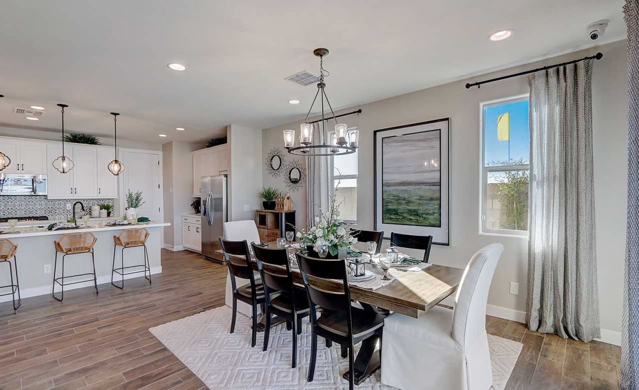 Luxury Dining and Kitchen Area in The Lakes at Rancho El Dorado Luxurious dining and kitchen area with wood floors, pendant lights, in The Lakes at Rancho El Dorado.
