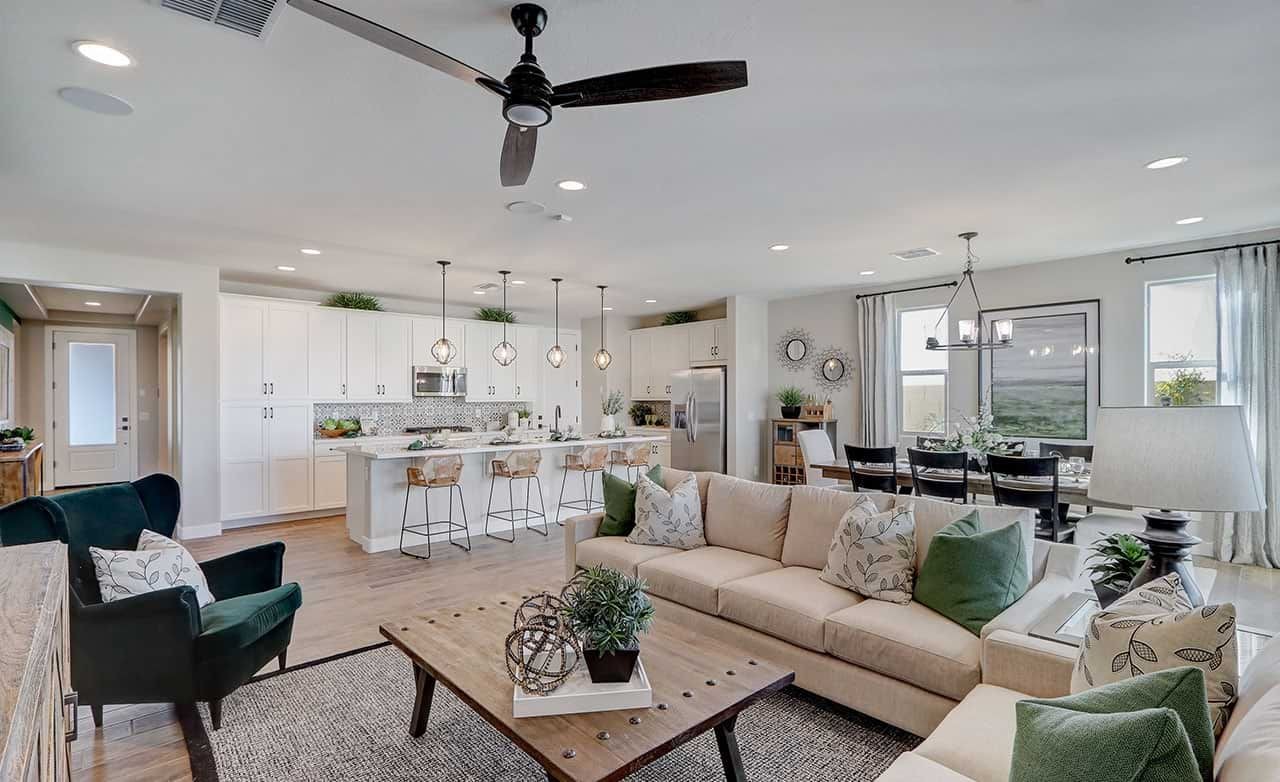 Elegant Open-Plan Interior at The Lakes, Rancho El Dorado, Arizona Luxurious open-plan kitchen and living area, high-end finishes, pendant lights, Rancho El Dorado, Arizona.