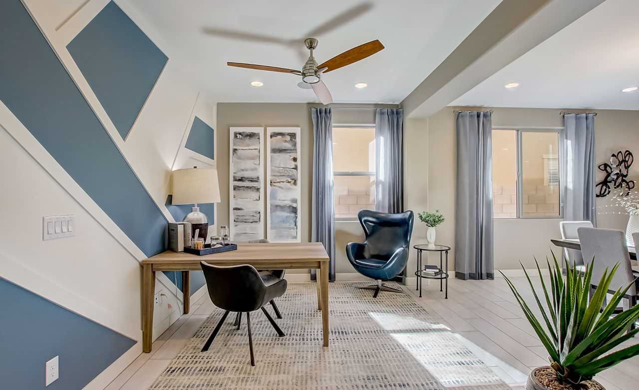 Modern Office Design in The Lakes at Rancho El Dorado Chic office with geometric blue accent wall, modern furnishings in Rancho El Dorado home.