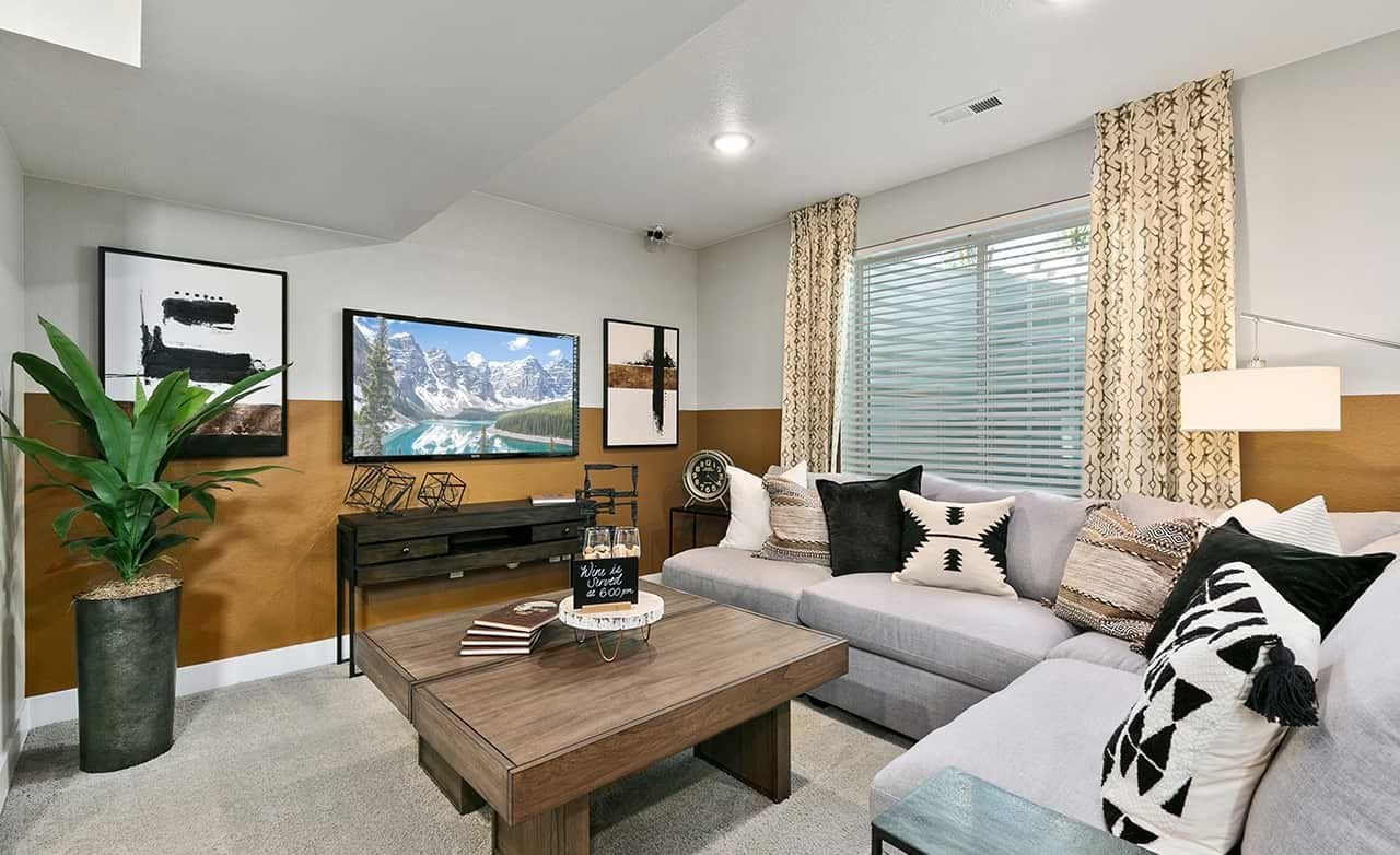 Modern Nordic Living Room Design at Trailside on Harmony, Utah Modern living room, Nordic design, cozy sectional, geometric decor, Trailside on Harmony, Utah. Beige walls, elegant art.